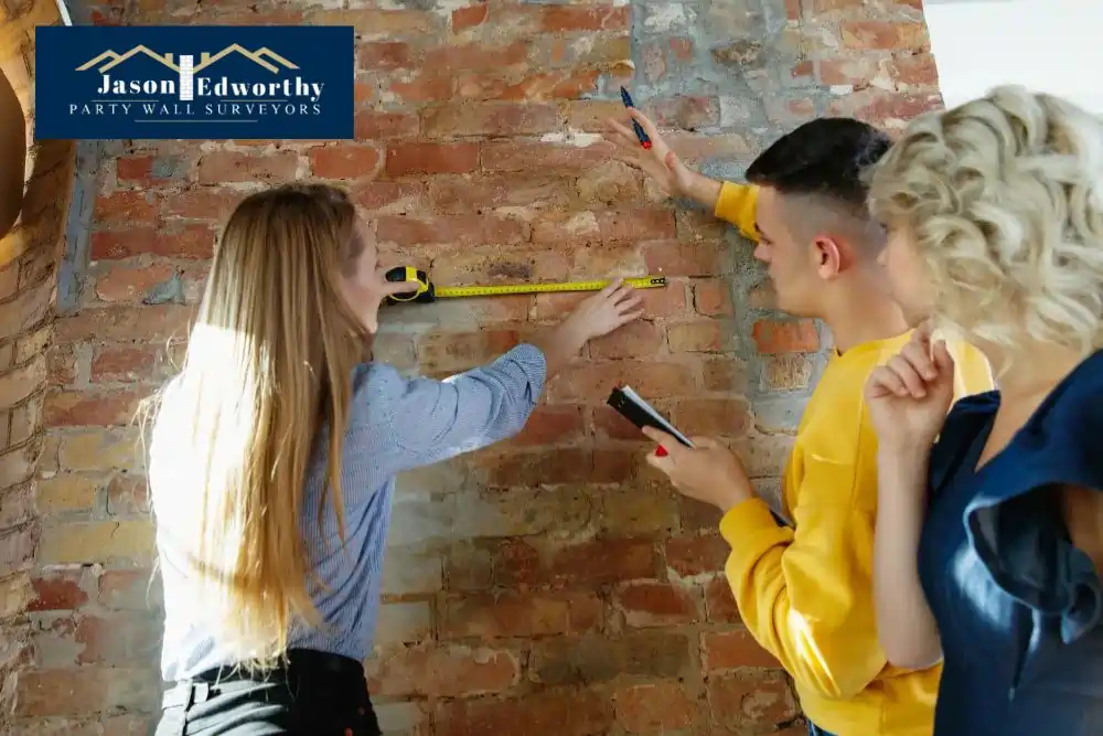 What are the responsibilities of a party wall surveyor Hoyland?